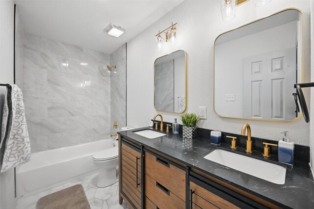 7201 Harwick Ln, North Richland Hills, TX 76182 - full bathroom with marble finish flooring, bathtub / shower combination, double vanity, and toilet