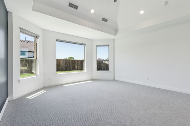 16431 Elk Hollow Rd, Frisco, TX 75035 - empty room featuring carpet flooring, baseboards, a raised ceiling, and recessed lighting