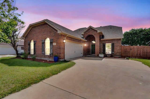 107 Oak Hollow Ln, Red Oak, TX 75154 - traditional home featuring brick siding, driveway, a garage, and roof with shingles