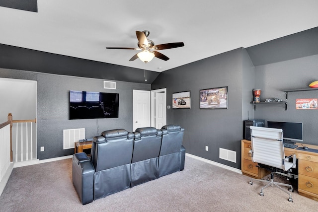 107 Oak Hollow Ln, Red Oak, TX 75154 - carpeted home theater featuring a ceiling fan, lofted ceiling, and baseboards