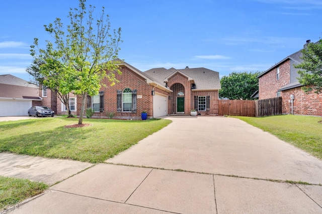 107 Oak Hollow Ln, Red Oak, TX 75154 - traditional home featuring a garage, driveway, and brick siding