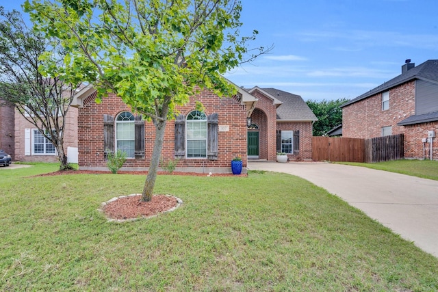 107 Oak Hollow Ln, Red Oak, TX 75154 - traditional-style home featuring brick siding and concrete driveway