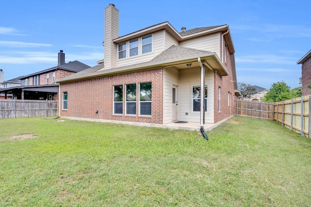 107 Oak Hollow Ln, Red Oak, TX 75154 - rear view of house featuring a chimney, brick siding, and roof with shingles