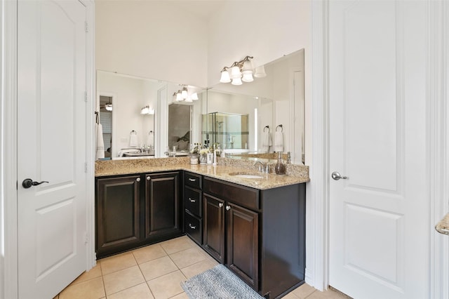 12341 Payne St, Frisco, TX 75033 - bathroom with tile patterned floors, double vanity, ensuite bathroom, and a shower