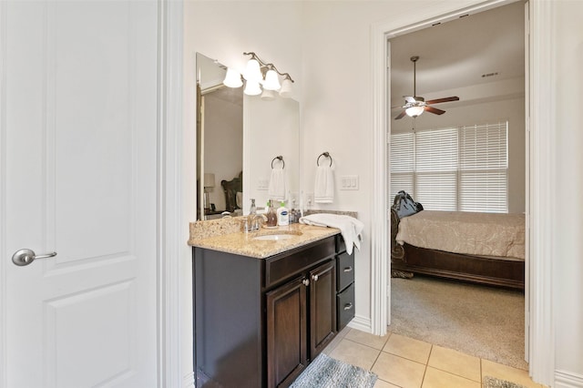 12341 Payne St, Frisco, TX 75033 - ensuite bathroom with ceiling fan, vanity, and tile patterned floors