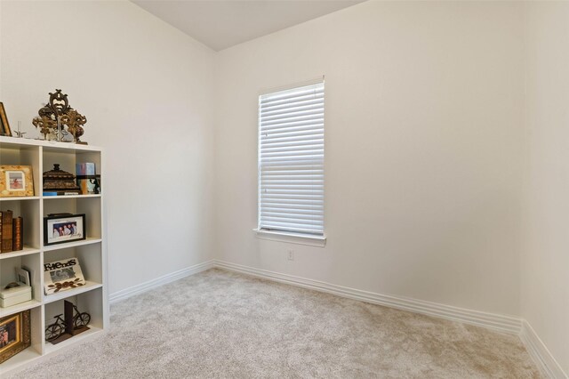 12341 Payne St, Frisco, TX 75033 - carpeted empty room featuring baseboards and healthy amount of natural light