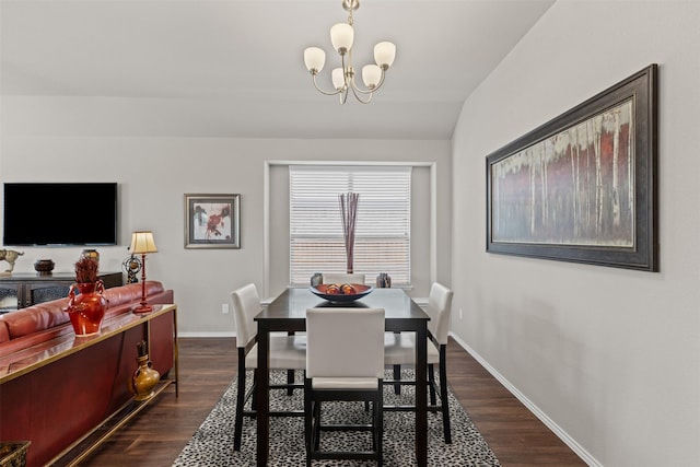 2101 Swenson Ranch Trl, Fort Worth, TX 76134 - dining area featuring dark wood finished floors, a chandelier, baseboards, and vaulted ceiling
