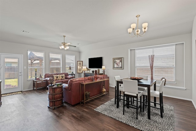 2101 Swenson Ranch Trl, Fort Worth, TX 76134 - living area featuring dark wood finished floors, a chandelier, a ceiling fan, and baseboards