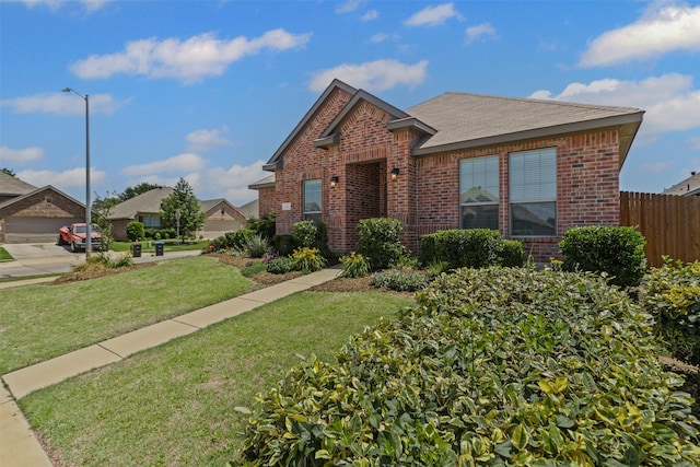 2101 Swenson Ranch Trl, Fort Worth, TX 76134 - view of front facade with brick siding and a shingled roof
