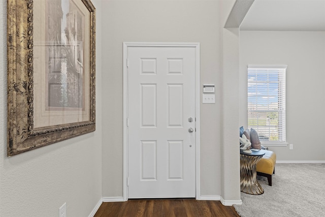2101 Swenson Ranch Trl, Fort Worth, TX 76134 - entryway with baseboards and dark wood finished floors