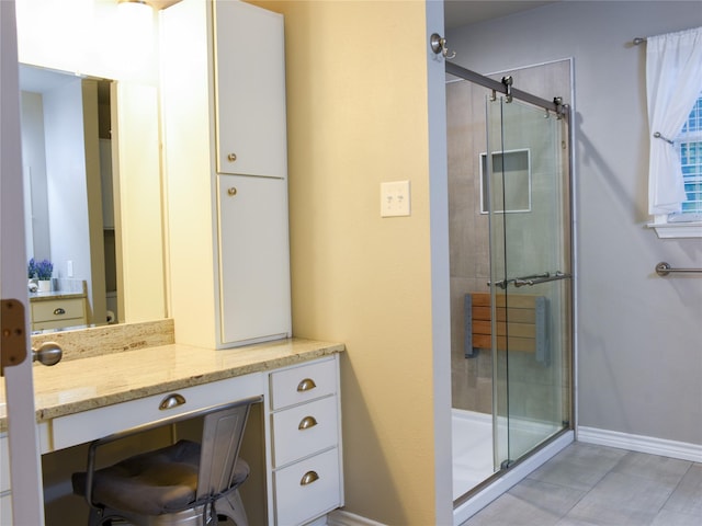 2226 Bethany Rd, Sherman, TX 75090 - full bathroom with a stall shower, baseboards, and vanity
