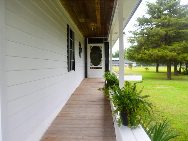 2226 Bethany Rd, Sherman, TX 75090 - wooden porch featuring a yard