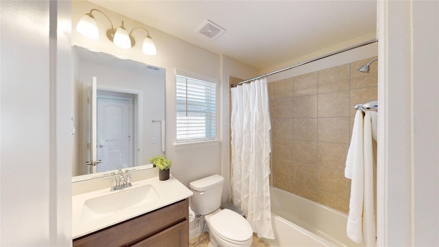 2753 Henson Ln, Garland, TX 75040 - full bath with vanity, shower / tub combo, and toilet