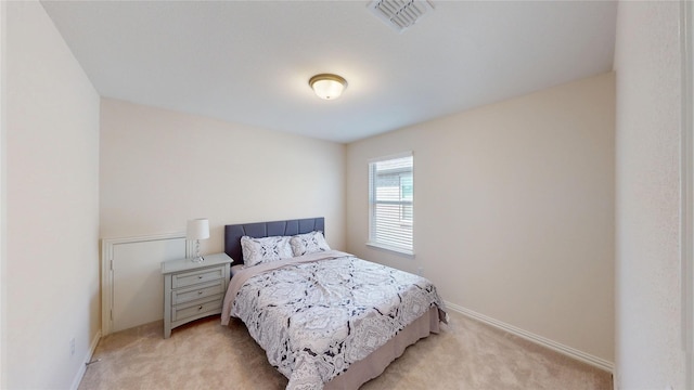 2753 Henson Ln, Garland, TX 75040 - bedroom featuring light colored carpet and baseboards