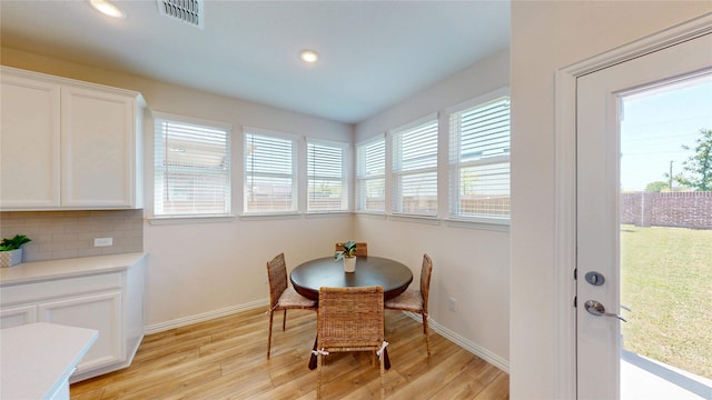 2753 Henson Ln, Garland, TX 75040 - dining room with light wood-style flooring, baseboards, and recessed lighting