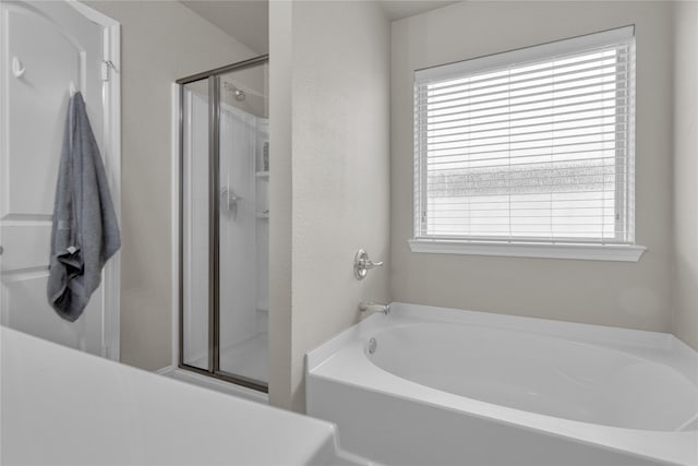 408 Prescott Ln, Fort Worth, TX 76036 - bathroom featuring a bath and a stall shower