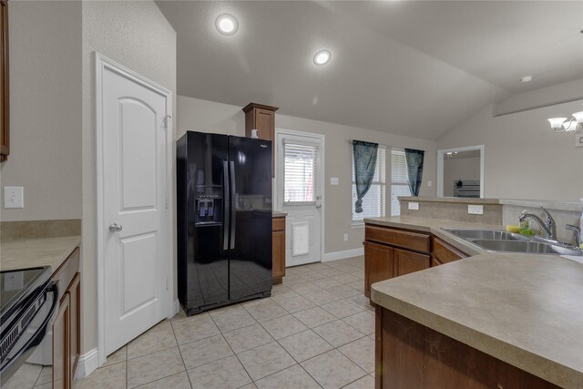 408 Prescott Ln, Fort Worth, TX 76036 - kitchen featuring black appliances, a sink, a chandelier, light tile patterned floors, and lofted ceiling