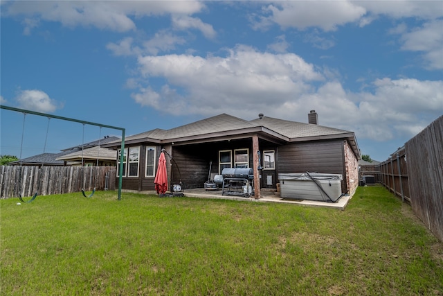 408 Prescott Ln, Fort Worth, TX 76036 - rear view of house featuring a hot tub, a patio area, a chimney, and central AC unit