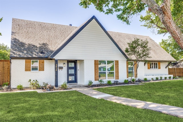 3414 Janlyn Ln, Farmers Branch, TX 75234 - tudor house featuring brick siding and a shingled roof