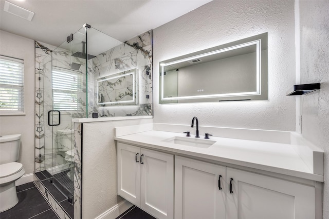 3414 Janlyn Ln, Farmers Branch, TX 75234 - full bath featuring toilet, vanity, a marble finish shower, a textured wall, and tile patterned floors