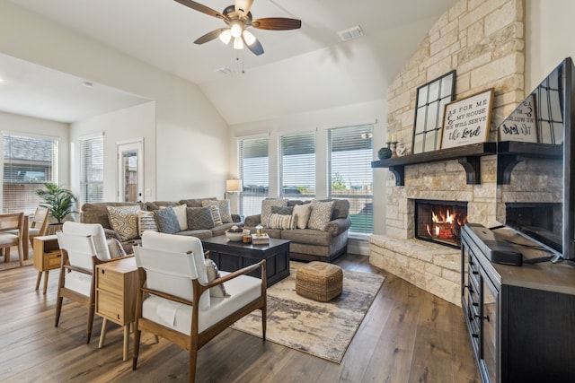 233 Lakewood Ln, Ponder, TX 76259 - living area with lofted ceiling, a fireplace, ceiling fan, and hardwood / wood-style flooring