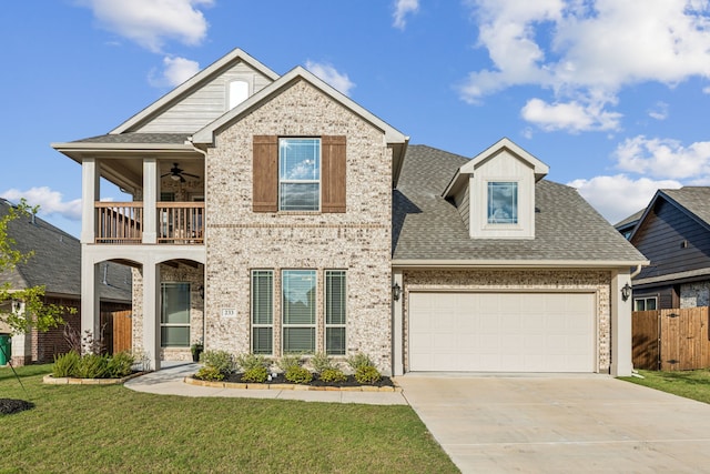 233 Lakewood Ln, Ponder, TX 76259 - view of front of home featuring a balcony, concrete driveway, a shingled roof, brick siding, and ceiling fan