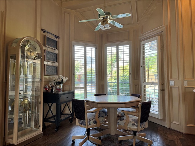 5812 Braemar Dr, Plano, TX 75093 - dining room featuring a decorative wall, dark wood-style flooring, and a ceiling fan