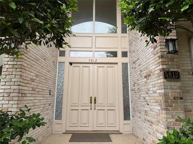 5812 Braemar Dr, Plano, TX 75093 - property entrance featuring brick siding