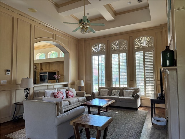 5812 Braemar Dr, Plano, TX 75093 - living room with a decorative wall, coffered ceiling, a ceiling fan, dark wood-type flooring, and beamed ceiling