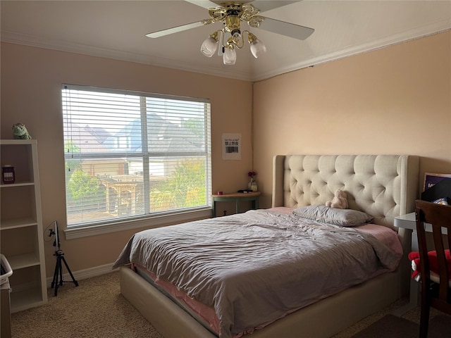 5812 Braemar Dr, Plano, TX 75093 - carpeted bedroom with crown molding, baseboards, and a ceiling fan