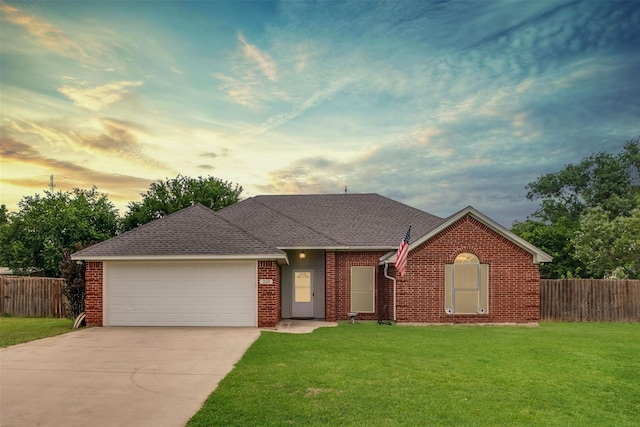 320 Mockingbird Ln, Springtown, TX 76082 - view of front of house featuring an attached garage, concrete driveway, brick siding, and roof with shingles