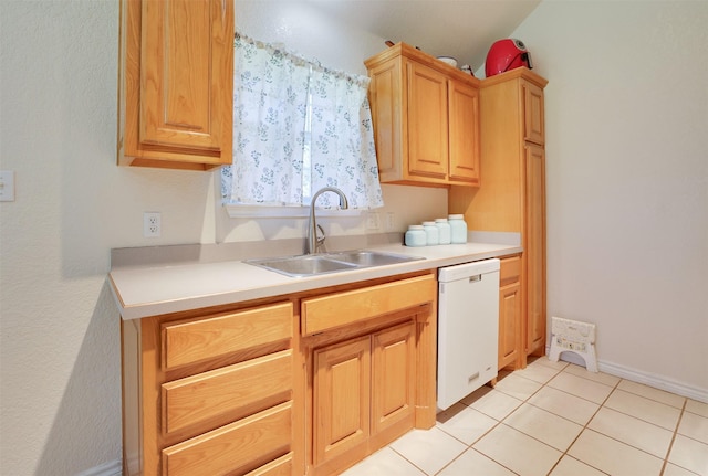 320 Mockingbird Ln, Springtown, TX 76082 - kitchen featuring white dishwasher, a sink, light countertops, and light tile patterned floors