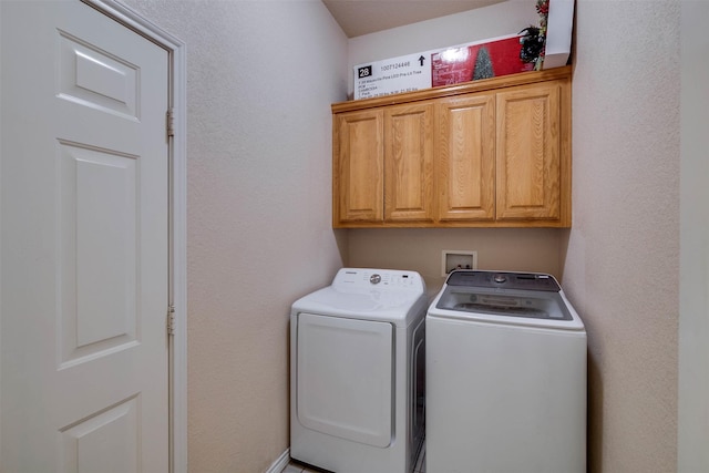320 Mockingbird Ln, Springtown, TX 76082 - laundry area with washer and dryer and cabinet space