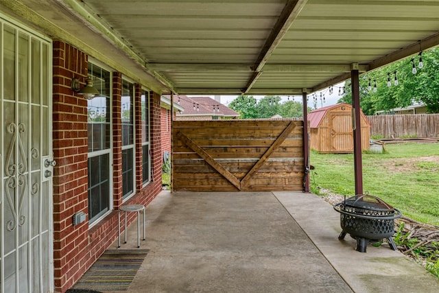 320 Mockingbird Ln, Springtown, TX 76082 - view of patio / terrace featuring an outdoor fire pit