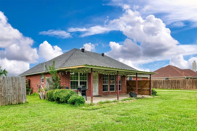320 Mockingbird Ln, Springtown, TX 76082 - rear view of house featuring a patio area, brick siding, and a shingled roof