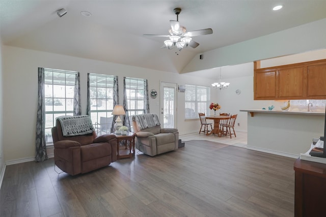 320 Mockingbird Ln, Springtown, TX 76082 - living area with vaulted ceiling, a ceiling fan, a chandelier, wood finished floors, and baseboards