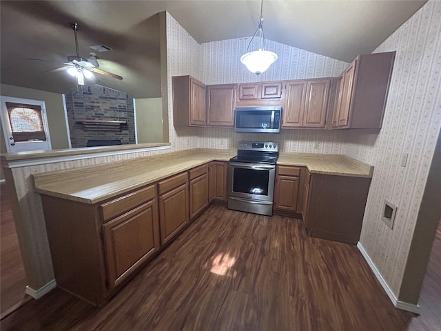 10058 Marblehead Ct, Fort Worth, TX 76108 - kitchen with appliances with stainless steel finishes, vaulted ceiling, wallpapered walls, dark wood-style flooring, and ceiling fan