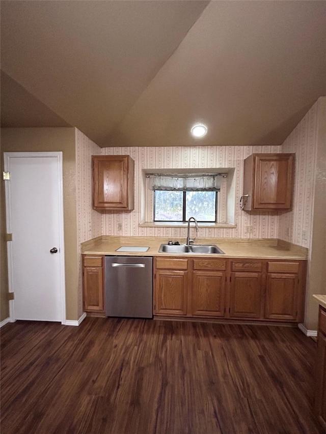 10058 Marblehead Ct, Fort Worth, TX 76108 - kitchen with stainless steel dishwasher, a sink, wallpapered walls, lofted ceiling, and dark wood-style floors