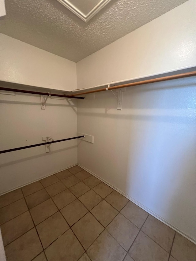 2617 Independence Dr, Mesquite, TX 75150 - spacious closet featuring light tile patterned flooring