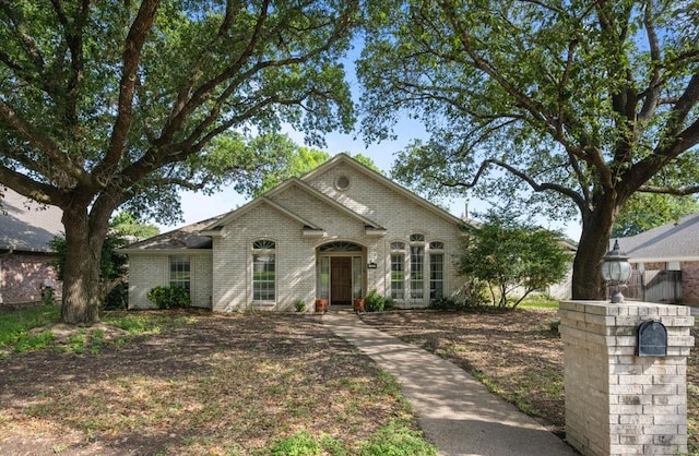 9505 Lost Trails Dr, Waco, TX 76712 - french country home featuring brick siding