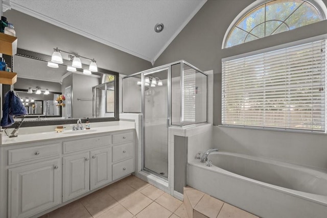 9505 Lost Trails Dr, Waco, TX 76712 - bathroom featuring ornamental molding, a garden tub, tile patterned flooring, a shower stall, and vanity