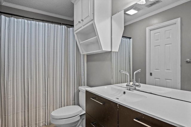 9505 Lost Trails Dr, Waco, TX 76712 - bathroom featuring vanity, toilet, a textured ceiling, and ornamental molding
