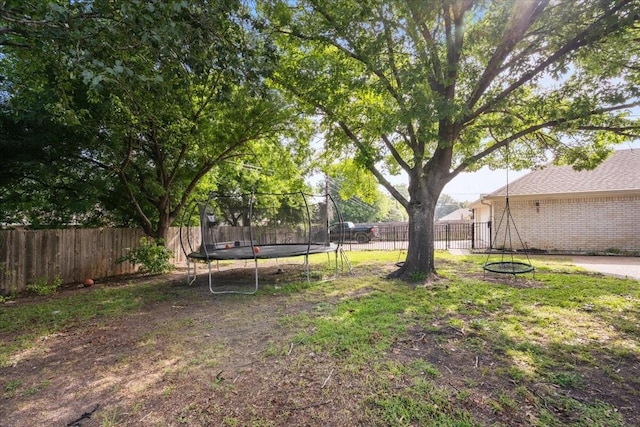 9505 Lost Trails Dr, Waco, TX 76712 - view of yard with a trampoline