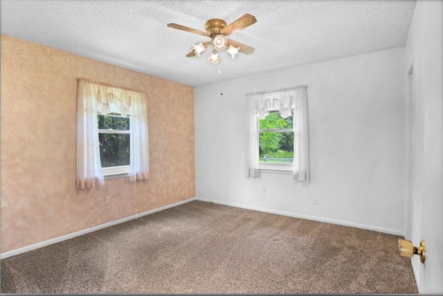 880 S Fm 779, Emory, TX 75440 - unfurnished room with a ceiling fan, carpet flooring, a textured ceiling, and baseboards