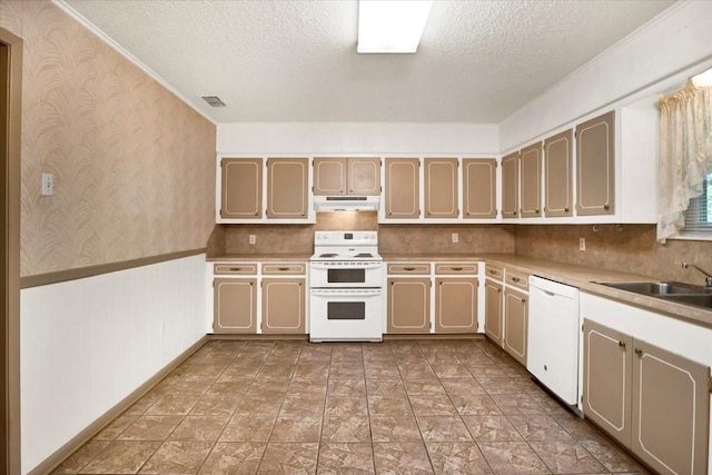 880 S Fm 779, Emory, TX 75440 - kitchen with white appliances, under cabinet range hood, a sink, wallpapered walls, and a textured ceiling
