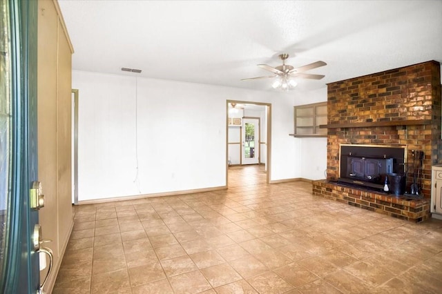 880 S Fm 779, Emory, TX 75440 - unfurnished living room featuring a ceiling fan and baseboards