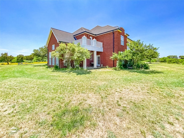 3226 County Road 360, Merkel, TX 79536 - back of property featuring a yard and brick siding