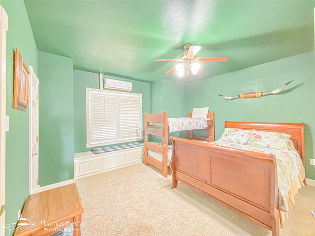 3226 County Road 360, Merkel, TX 79536 - bedroom with an AC wall unit, carpet flooring, ceiling fan, and baseboards