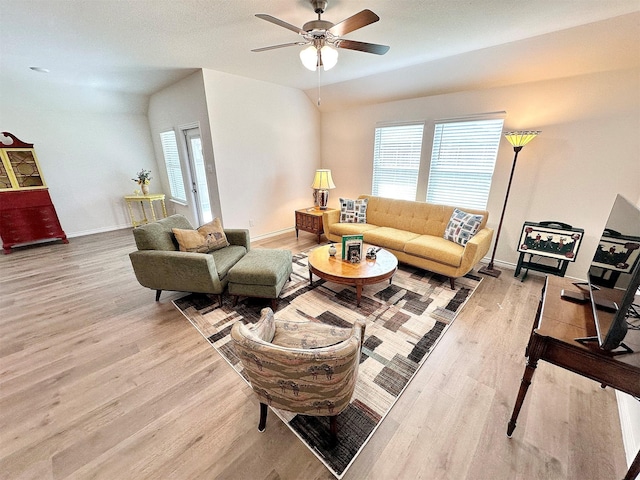 1416 Blossom Court Dr, Princeton, TX 75407 - living area featuring wood finished floors, ceiling fan, and baseboards