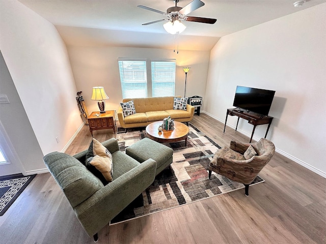 1416 Blossom Court Dr, Princeton, TX 75407 - living room with wood finished floors, healthy amount of natural light, lofted ceiling, a ceiling fan, and baseboards
